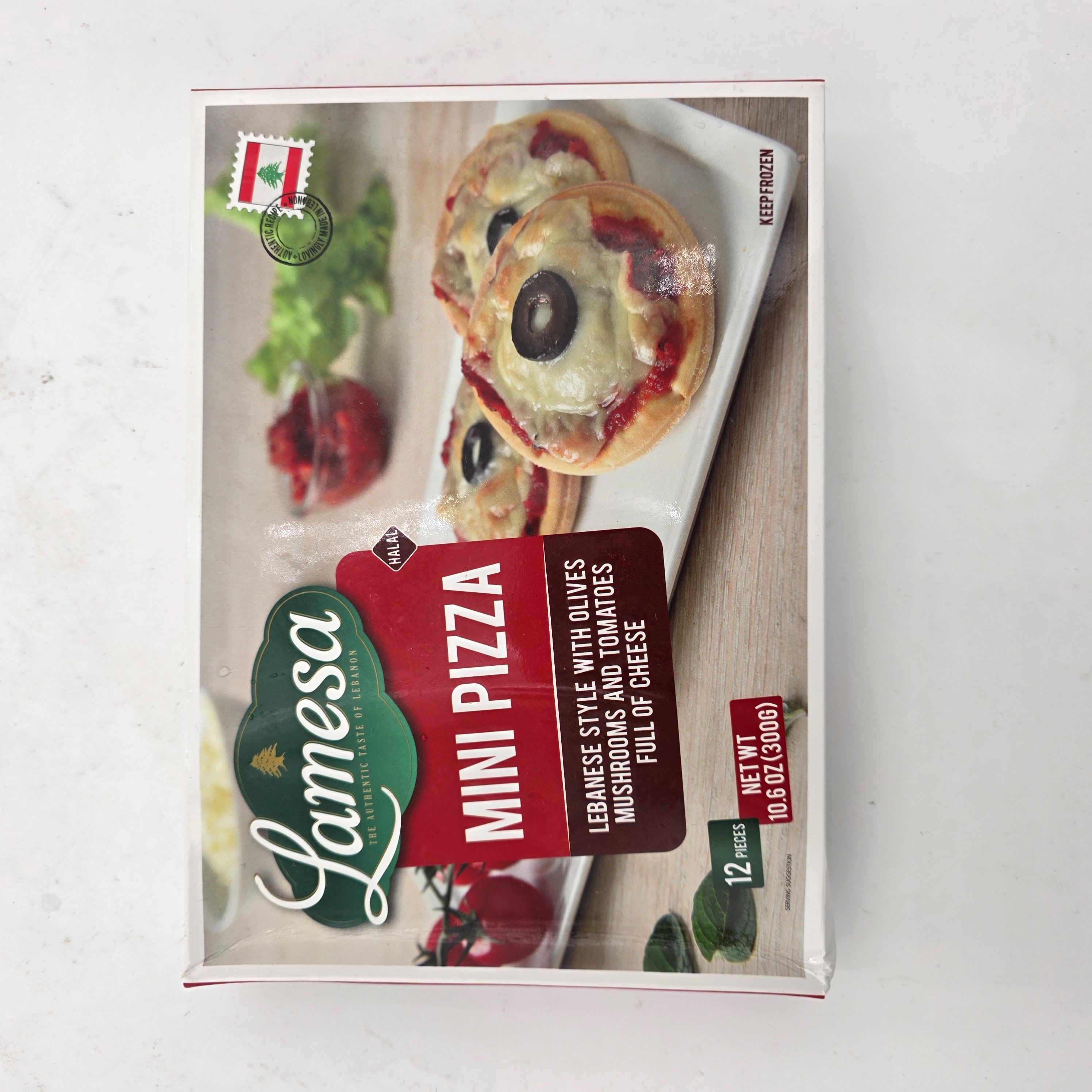 MINI PIZZA WITH OLIVES AND MUSHROOMS